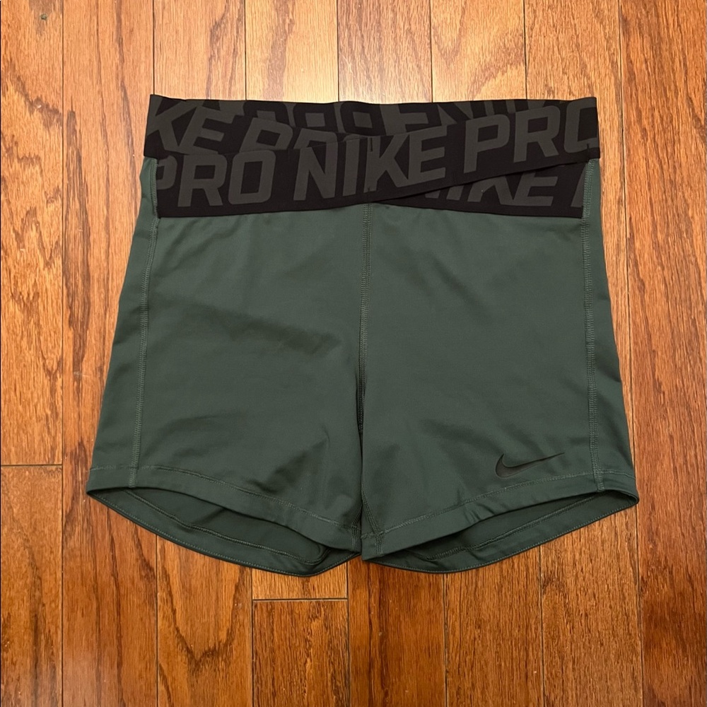 Nike Women's Dark Green Athletic Shorts with Black Waistband